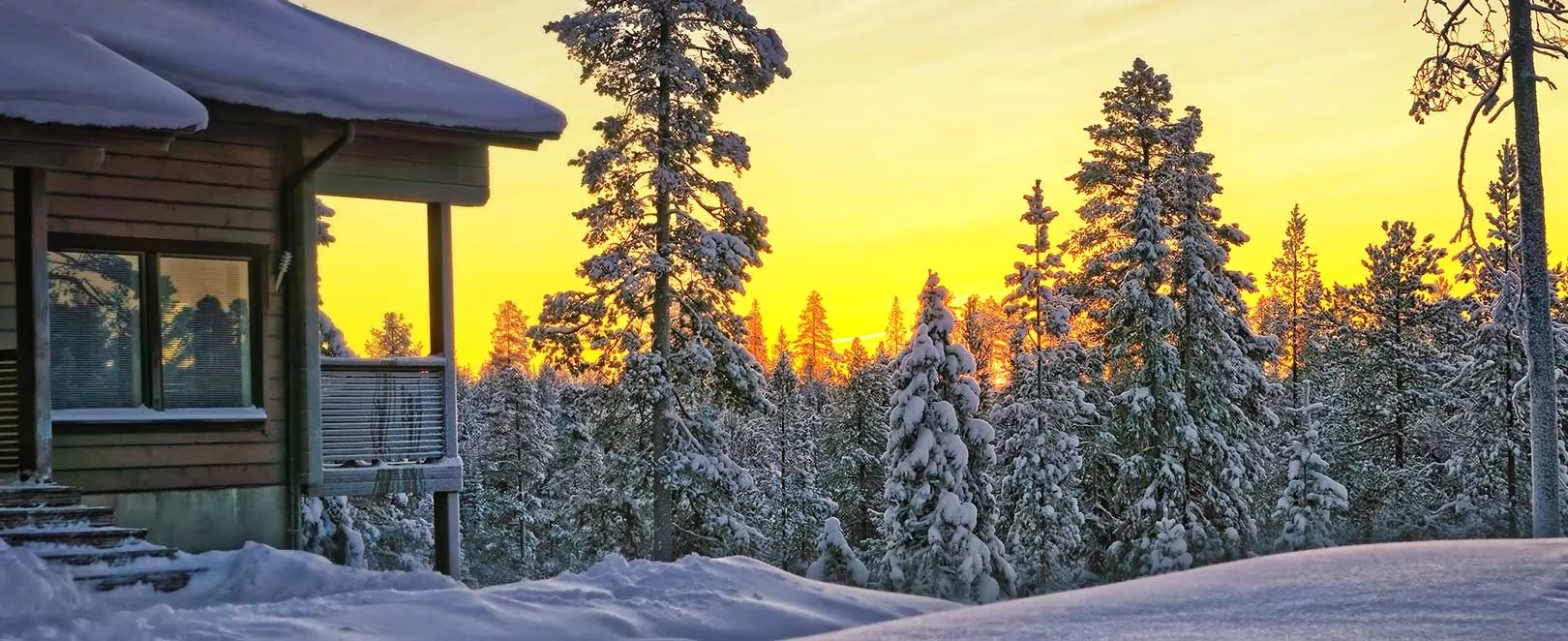 chalet sous la neige