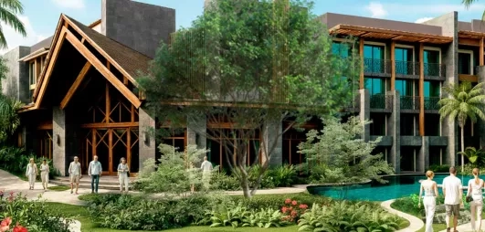 entrée de l'hôtel en bois, bassin d'eau, végétation, palmiers