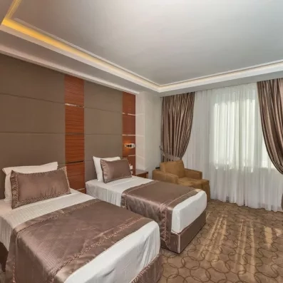 chambre avec deux lits simples