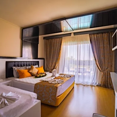 chambre avec deux lits doubles 