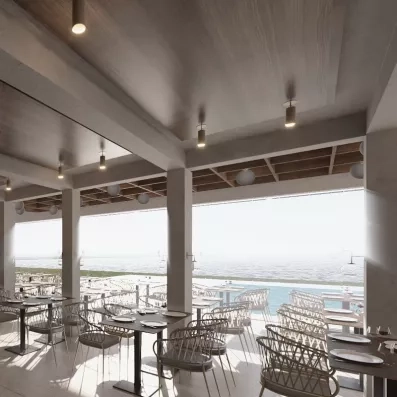 salle de restaurant sur la terrasse vue sur la piscine