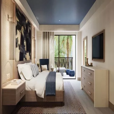 Suite junior familiale, écran plat contre le mur, lit king size, terrasse avec petite table et chaises